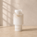 The Reveal, a Spanish alabaster vase by Lomāe, twelve centimetres across and twenty-six tall