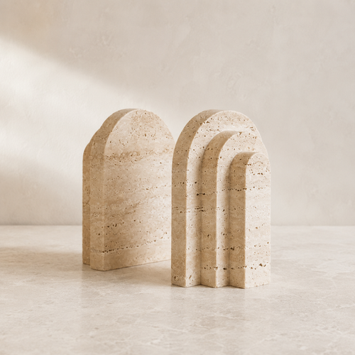 The Lintel, a pair of yellow travertine bookends by Lomāe